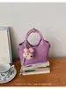 Bolso cruzado de un solo hombro, Bolso de mano de lujo de nicho coreano, Bolso tote pequeño, Bolso cubo de uso diario exquisito y moderno