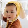 Versión coreana de gorra de protección para las orejas de conejo de dibujos animados al por mayor otoño e invierno nuevo para niños y niñas orejas largas gorra fina de terciopelo 2098