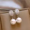 Pendientes de circonita en forma de gota de agua de lujo nicho de alta gama para mujer, modernos y versátiles, elegantes para el trabajo, con tachuelas de colgante de perla