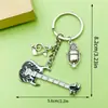Diseño Creativo Plata Vintage Saxofón Cinta Musical Llavero Transfronterizo Más Vendido Colgante de Bolsa Pequeño Accesorio