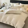 Conjunto de quatro peças de luxo leve de veludo de leite, espessado para o inverno, flanela, capa de edredom de veludo coral, lençol de cama, roupa de cama de inverno