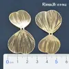 Joyería de cobre y hierro agujero fino hueco corsage negativo flor de carácter 8 combinación flor pétalos de dos hojas trébol de cuatro hojas hojas