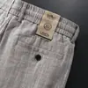 Pantalones Casuales de Lino para Hombre 2026 Estilo Nuevo Cintura Elástica Cordón Holgados Rectos Color Lavado Tejido Algodón-Lino Pantalones Largos para Hombre Modernos