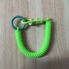 Llavero con resorte de plástico de fábrica, cuerda antipérdida para teléfono móvil, cordón telescópico con resorte, cordón para llavero.