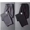 Pantalones Casuales de Lino Delgado de Seda Helada Nuevos de Verano para Hombre, Pierna Recta con Etiqueta, Estilo Coreano, Corte Holgado, Talla Grande, Pantalones Deportivos Acortados