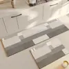 Alfombrilla especial para suelo de cocina japonesa 2024 nuevo estilo crema lodo de diatomeas antideslizante impermeable y a prueba de aceite alfombra larga