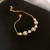 Pulseira Exquisita de Flor de Zircônia e Pérola Europeia e Americana, Pulseira Elegante e da Moda, Luxo Leve, Design de Joias de Alto Padrão, Estilo de Nicho