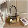 Bolso pequeño vintage de textura de alta calidad para mujer 2026 nuevo estilo moderno versátil de un solo hombro para llevar debajo del brazo bolso de mano para ir al trabajo