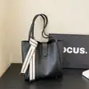 Bolso Retro de Diseño de Nicho para Mujer Modelo Nuevo 2026 Gran Capacidad Texturizado Bolso Tote para Viajes Diarios Versátil Bolso Cubo de Hombro