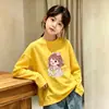Camiseta de algodão puro com estampa de desenho animado, manga longa, para meninas, primavera e outono, novo estilo 2026, top infantil moderno com gola redonda, camada interna