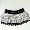 Falda corta sexy de retazos de verano estilo callejero japonés de cintura baja, minifalda de retazos a rayas estilo dulce oscuro