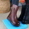 Botas nuevas de estilo chino hasta la mitad de la pantorrilla, botas Martin para mujer, nueva colección de invierno 2026, cómodas de suela blanda, cálidas con forro de lana, para madres