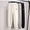 Pantalones de chándal gruesos con forro polar para mujer 2024 Otoño e Invierno Nuevos Talla Grande Moda Sueltos Jogger Casual Cálidos Pantalones Deportivos