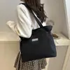Bolsa Tote de Ombro Casual Versátil Leve e de Grande Capacidade Nova Moda Outono 2026 para Estudantes Universitários que Vão para a Aula