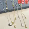 Colar em Y de Corrente com Pingente Borboleta Dourada e Franja Aço Titânio Textura Não Desbota Acessório Pingente Transfronteiriço Franja