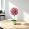 Nuevas plantas artificiales en maceta con diseño de cielo estrellado y flor de cerezo, perfectas para la decoración del hogar, creando una exhibición creativa y mejorando el ambiente de un restaurante