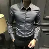 Camisa de color sólido para hombre nueva primavera 2024 de manga larga para negocios con botones ocultos, camisa ajustada de moda para vestir formal sin planchado
