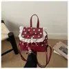 Mochila Pequena Feminina Moda Fresca com Renda de Bolinhas Estilo Coreano 2026 Nova Renda Leve para Deslocamento e Viagem