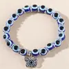 Amazon Explosiones Pulsera Ojo de Diablo Mariposa Elefante Mano de Fátima Colgante Resina Cuenta Redonda Pulsera Ojo Azul