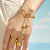 Corrente de dedo de pulseira designer de aço inoxidável 316L banhada a ouro 18k com pingentes de gota e pedra olho de gato, estilo leve e luxuoso, para mulheres