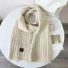 Bufanda cálida de otoño e invierno Dongdaemun Corea del Sur Bufanda tejida dulce japonesa etiqueta de tela para mujer Bufanda de lana lisa combinable