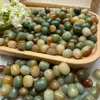 Raíz de Bodhi cuentas sueltas diy cuentas de pastel de arroz alrededor del dedo texto suave cuentas para jugar verde degradado quema de carbón Duobao bodhi mano