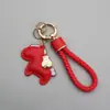 Chaveiro Fique Rico Imediatamente Corda Trançada de Couro Fashionável Carro Desenho Animado Fofo Chaveiro Bolsa Pingente de Pônei