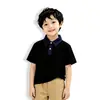 Camisa polo de manga corta para niño, tejido de punto con patchwork de mezclilla, top versátil casual de verano, envío directo del fabricante