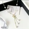 Estilo Francés Elegante Moda Versátil Colgante de Perlas Artificiales Borla de Mariposa Sensación de Alta Gama Lujo Ligero Versátil Collar