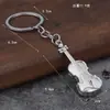 Directo de fábrica retro guitarra violín metal llavero joyería transfronteriza venta al por mayor colgante colgante