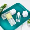 Stock Listo del Fabricante Botella Rellenable de Loción de 40 ml, Botella Vacía Transparente Cuadrada Portátil con Atomizador Cosmético, Botella de Muestra