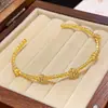 Pulsera Nudo de Circonita Hueca Electrochapada en Oro Real de 18K, Pulsera de Lujo Ligero de Gama Alta, Accesorio de Mano Moderno y Versátil para Mujeres