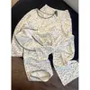 Conjunto de Pijama Japonês Estilo Nicho com Estampa Floral de Manga Longa para Mulheres Primavera/Outono 2026 Novo Conjunto de Calça Longa para Casa Adequado para Sair
