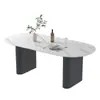 Mesa de comedor de color crema, moderna y lujosa con tapa de piedra para uso doméstico, con un diseño moderno y minimalista de forma ovalada negra, adecuada para comedores