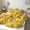 Estilo INS color sólido algodón puro algodón lavado artículo individual funda de edredón funda de edredón 100% algodón juego de tres piezas estudiante doble juego de tres piezas ropa de cama