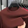 Suéter de cuello redondo de mezcla de lana y seda para hombre, otoño 2026, fino, manga larga, color liso, tejido, capa base para hombre, suéter de lana para hombre