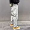 Novo modelo de outono precoce para comércio exterior com pequeno logotipo triangular, calça de trabalho outdoor estilo americano, calça casual funcional masculina, calça longa versátil soft shell