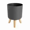 Macetetas auto-riego para flores al por mayor para alquiler, aptas para sala de estar y dormitorio, macetas grandes redondas de pie con patas de madera maciza