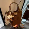 Bolso de Mano de Nicho Transfronterizo Bolso de Mujer 2026 Nuevo Bolso Cubo de Moda Versátil Bolso de Hombro Cruzado con Textura de Alta Calidad