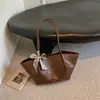 Bolso de hombro tipo tote retro elegante y de alta calidad para mujer, nueva colección otoño 2026, moderno y práctico para el trabajo y los desplazamientos