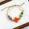 Jingdezhen Cerámica Pulseras de Paz Lote Mixto Venta al por Mayor Artículos Pequeños Joyería Pulseras Venta al por Mayor Artículos Pequeños Creativos para Venta en Puesto