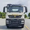 Suministro Directo de Fábrica de Transportadores de Plataforma Plana Sinotruk Howo Tx Cuatro Ejes Delanteros y Ocho Traseros Precio 380 Remolque para Excavadora Se Puede Dividir en Cuotas