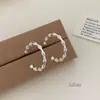 Pendientes de Aro Grandes Exagerados de Plata Metálica Estilo Francés Clásico para Mujer, Lujo Ligero con un Toque de Alta Gama, Elegantes Pendientes de Aro Circulares