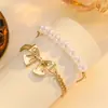 Amazon Conjunto de Pulseras de Perlas Cosidas con Colgante de Lazo Grande Joyería Dulce y Linda Venta al por Mayor