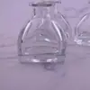 Botella de Aromaterapia Gruesa Transparente al por Mayor Botella de Vidrio Cuadrada con Forma de Yurta Difusor sin Llama Botella de Aromaterapia 50ml