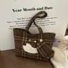 Bolsa de Tela con Dibujo de Cachorro Coreano para Mujer 2025 Nuevo Bolso de Mano de Gamuza a Cuadros Gran Capacidad Estilo Perezoso Bolso de Hombro