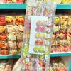 Perro West Highland lindo que brilla en la oscuridad, cara sonriente, paleta de frutas, juguete de dibujos animados, pinza para el pelo para niños de primaria y secundaria