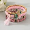 Bestseller transfronterizo estilo bohemio ojo turco borla colgante pulsera multicapa cordón elástico pulsera de cuentas