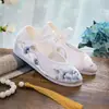 Grulla Blanca de Almohada 2026 Modelo Nuevo Tacón de Cuña Estilo Floral Étnico Zapatos de Baile Bordados con Aumento Interno de Altura para Madres y Mujeres