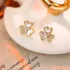 Brincos colar trevo madrepérola de luxo leve Widney senso alto elegante moda temperamento Coringa terno atacado
